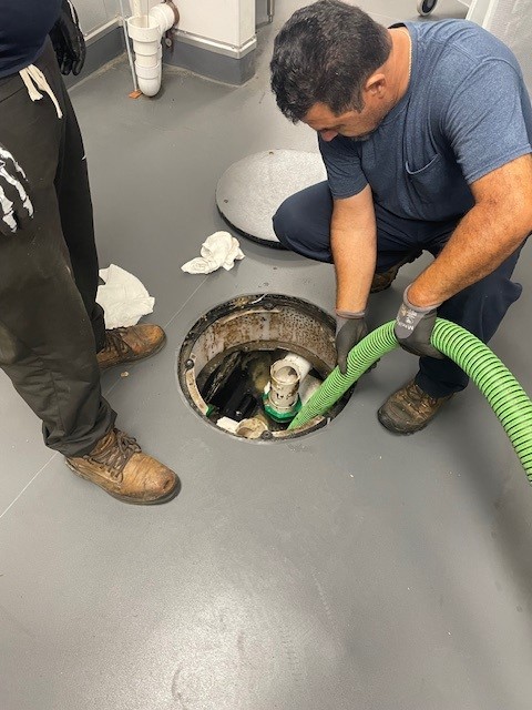 Grease trap cleaning using green hose